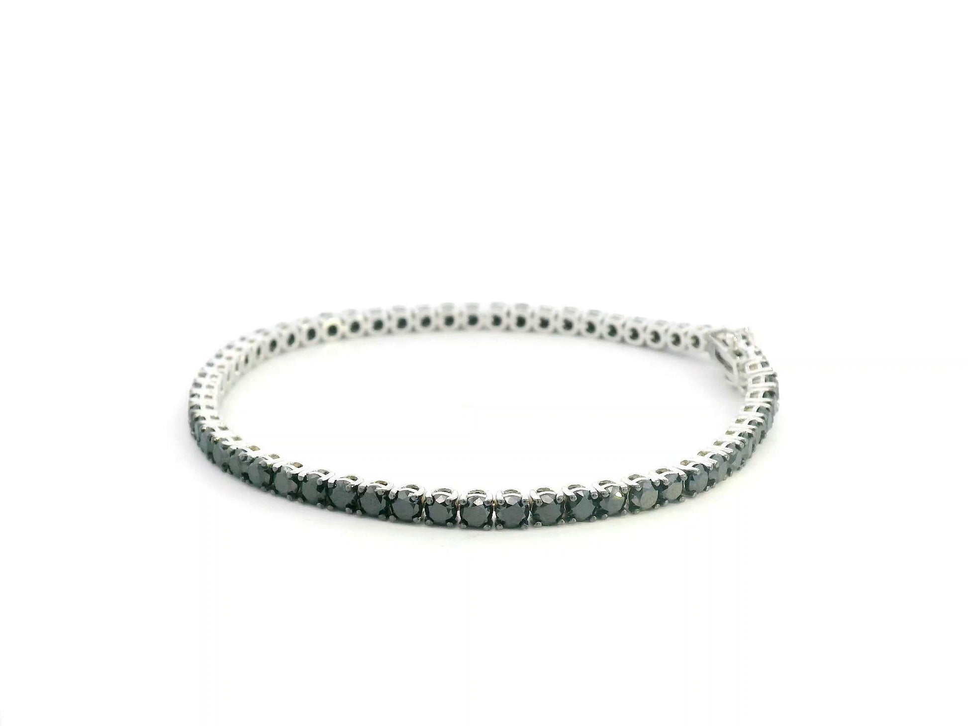 18K white gold tennis bracelet featuring 8.51 carats of natural black diamonds by Emirates Diamonds.