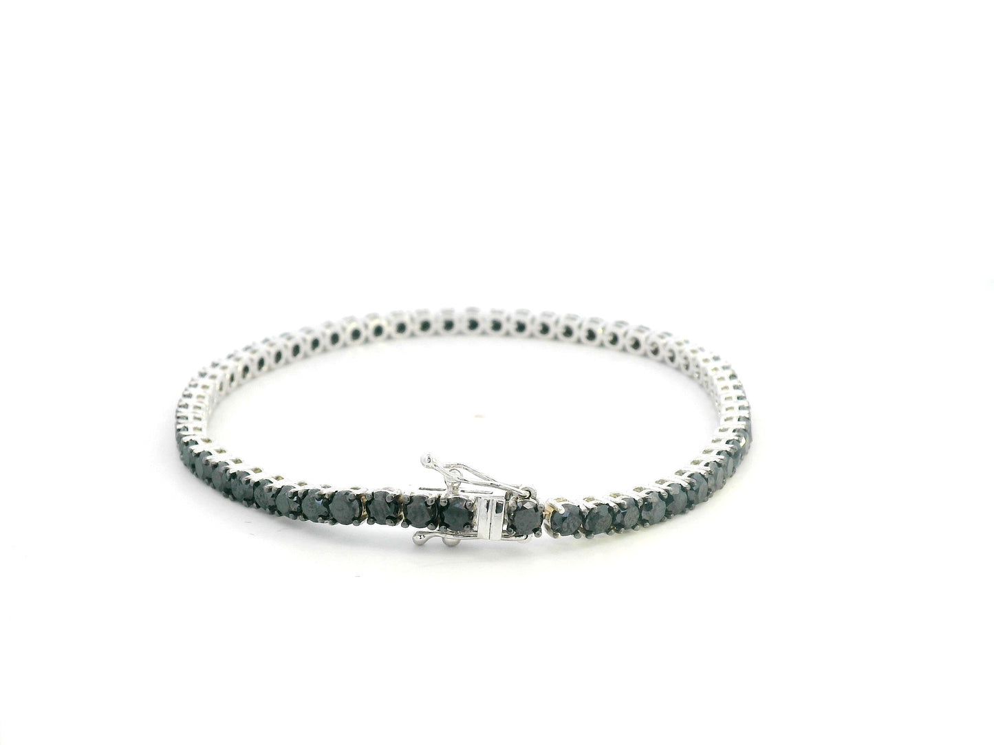 18K white gold tennis bracelet featuring 8.51 carats of natural black diamonds by Emirates Diamonds.