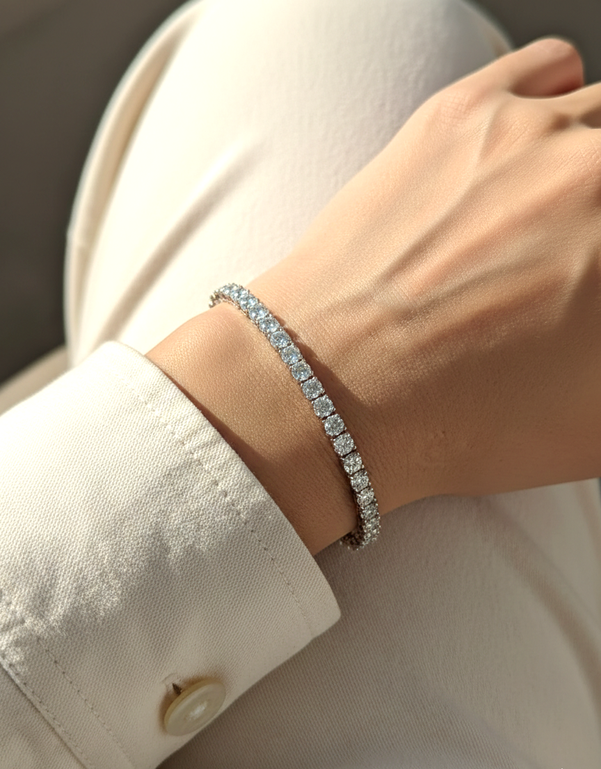 18K white gold diamond tennis bracelet featuring 10.17 carats of brilliant diamonds by Emirates Diamonds