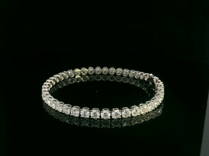 18K white gold diamond tennis bracelet featuring 10.17 carats of brilliant diamonds by Emirates Diamonds