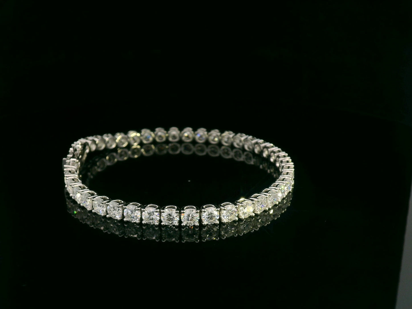 18K white gold diamond tennis bracelet featuring 10.17 carats of brilliant diamonds by Emirates Diamonds