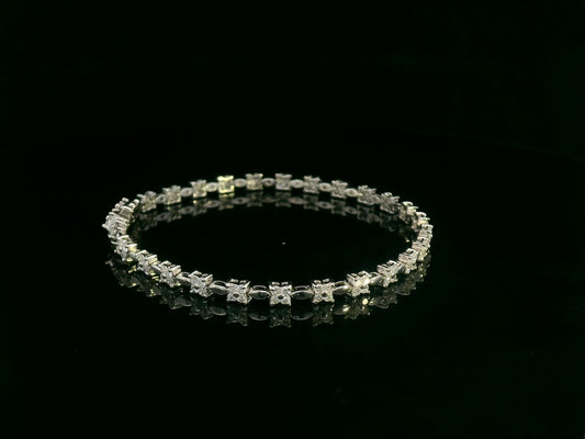 18K white gold floral diamond tennis bracelet featuring 1.60 carats of diamonds by Emirates Diamonds