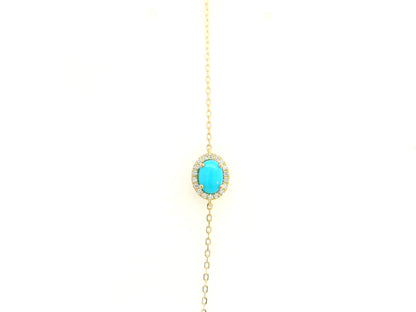 Turquoise diamond halo bracelet in 18K yellow gold with delicate chain by Emirates Diamonds