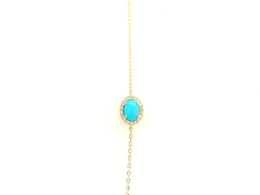 Turquoise diamond halo bracelet in 18K yellow gold with delicate chain by Emirates Diamonds