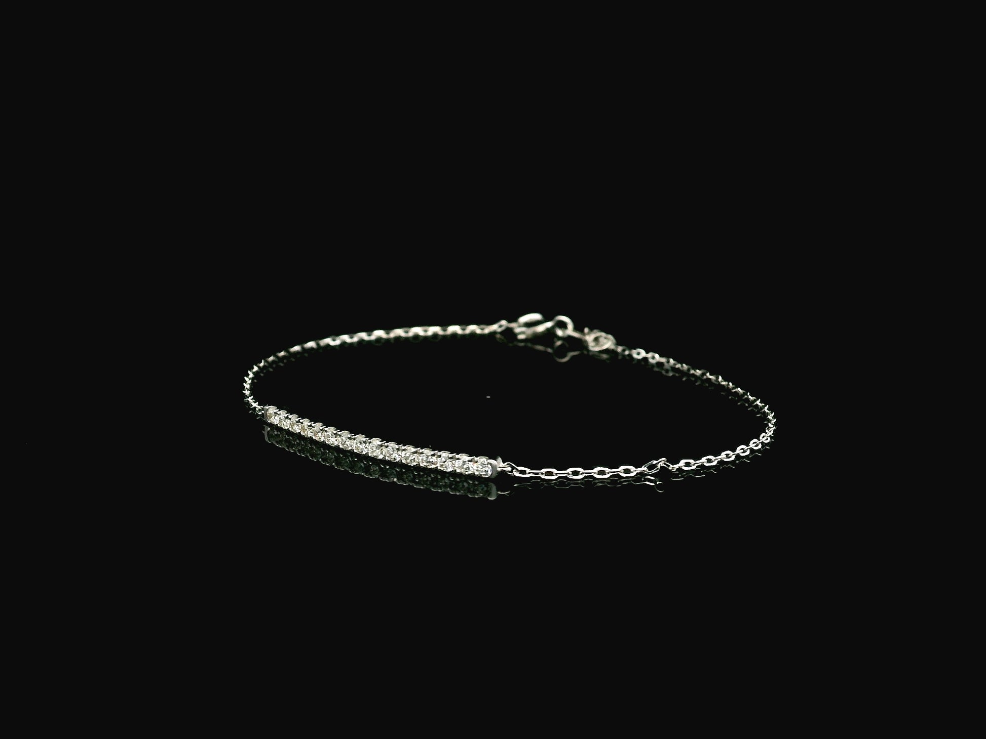 Diamond bar bracelet in 18K white gold featuring 0.38 carat diamonds by Emirates Diamonds.