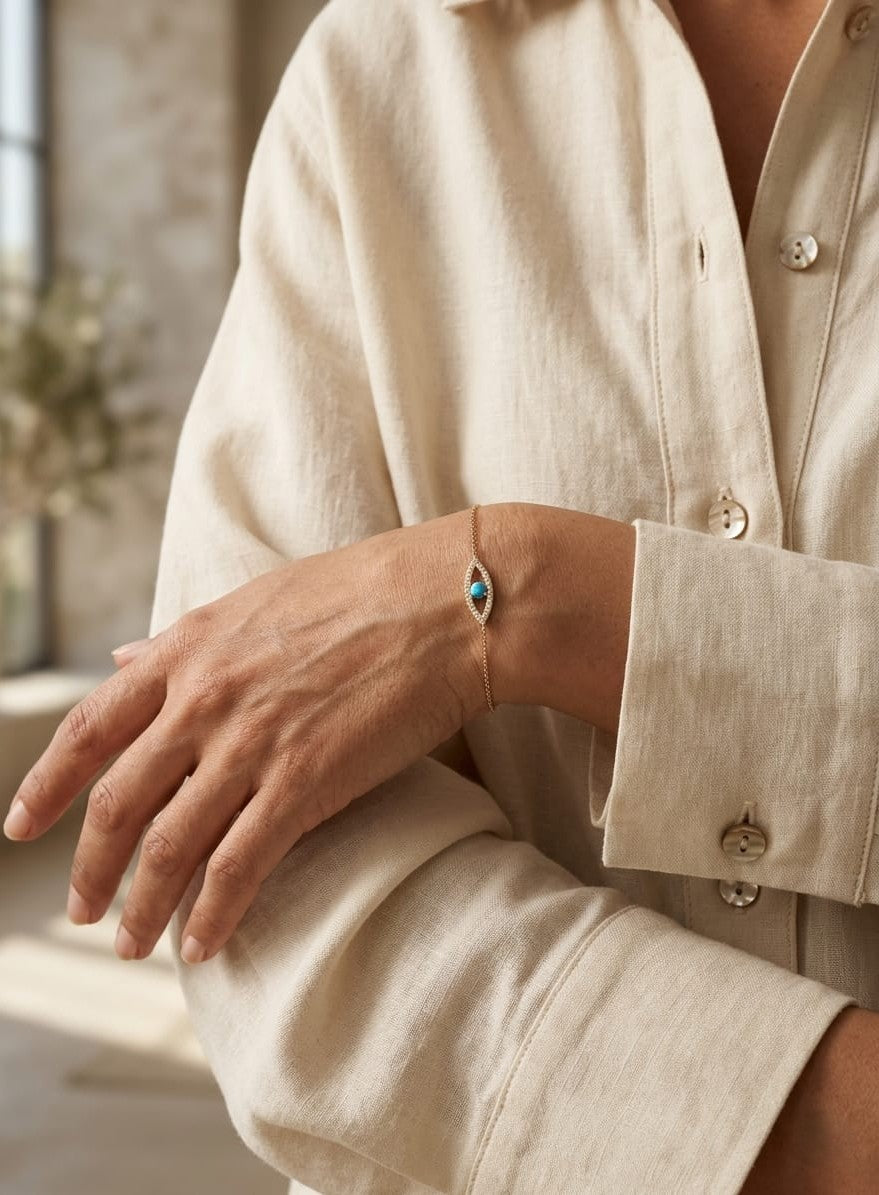 Turquoise evil eye diamond bracelet in 18K yellow gold by Emirates Diamonds