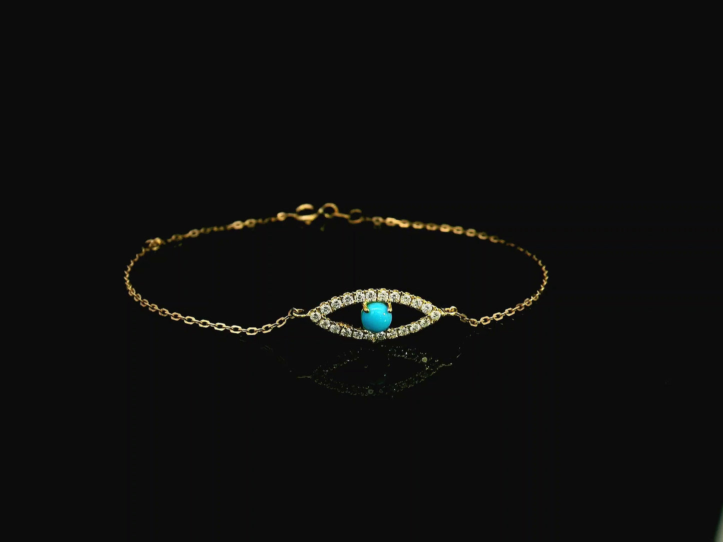 Turquoise evil eye diamond bracelet in 18K yellow gold by Emirates Diamonds