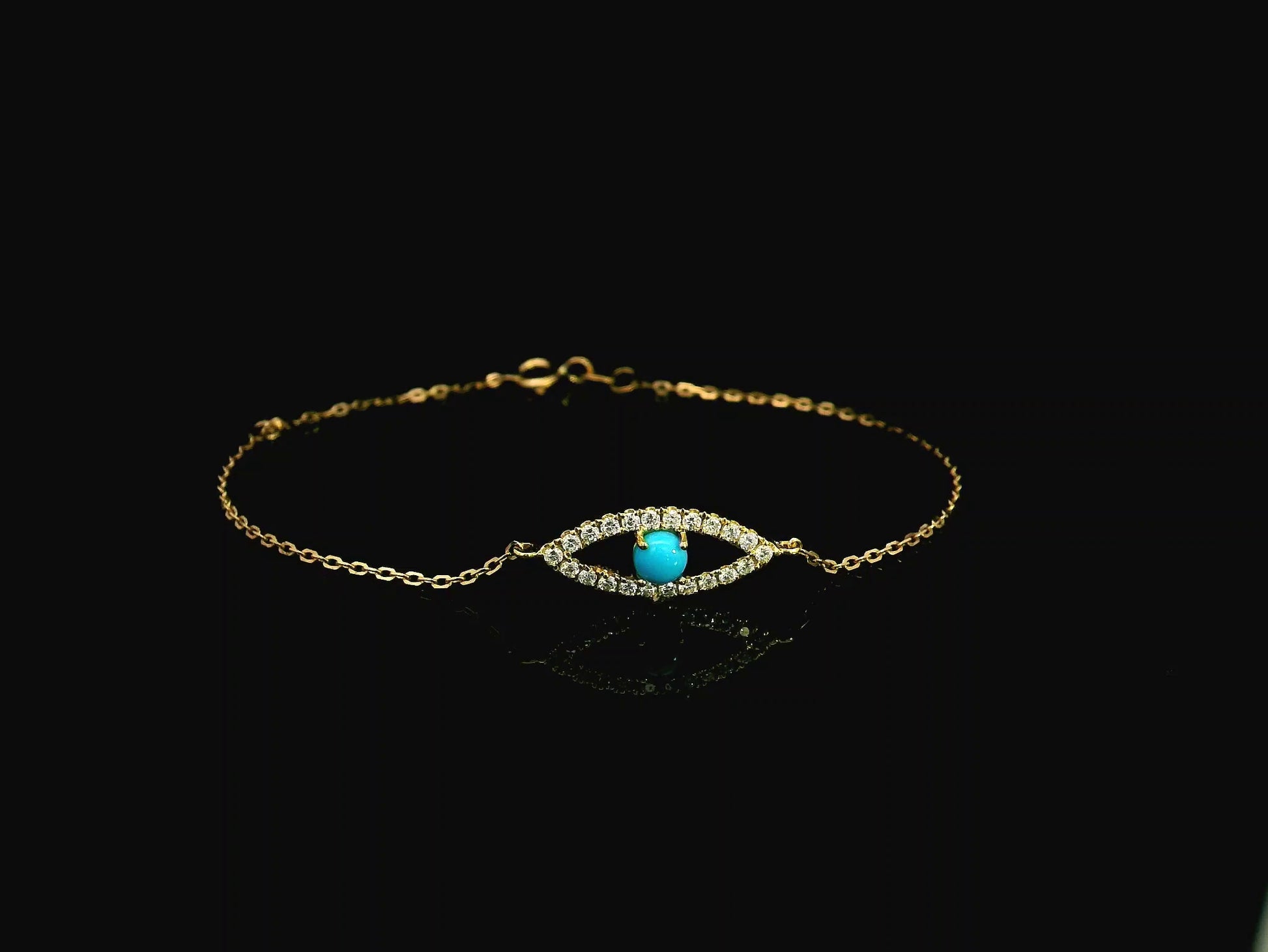 Turquoise evil eye diamond bracelet in 18K yellow gold by Emirates Diamonds