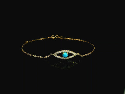 Turquoise evil eye diamond bracelet in 18K yellow gold by Emirates Diamonds