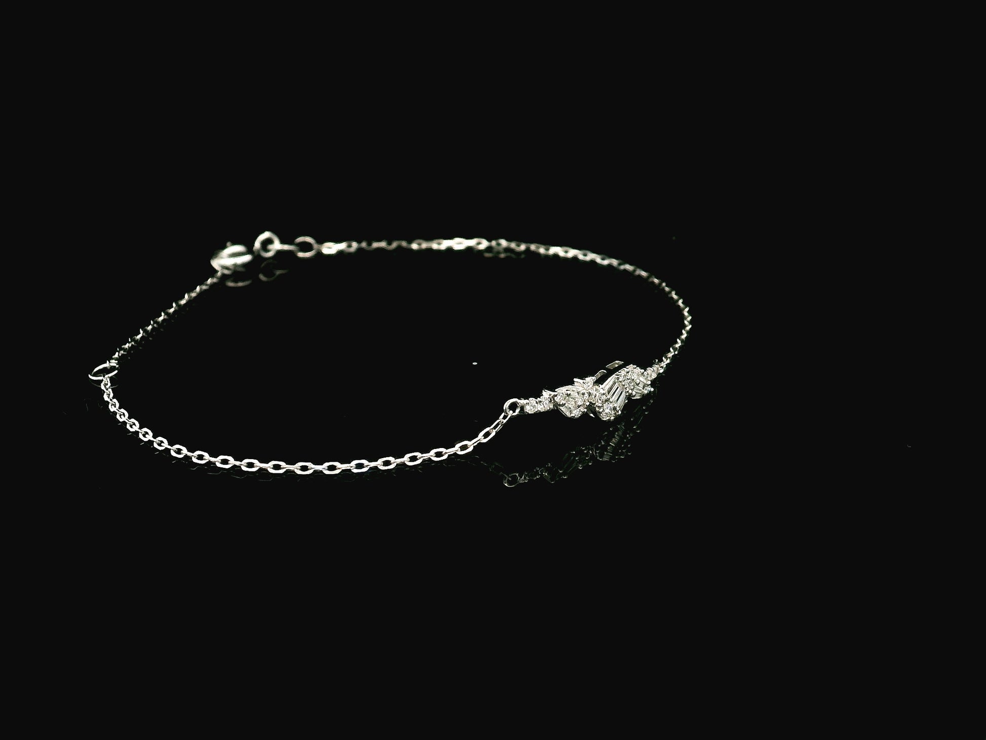 18K white gold diamond bracelet with round and baguette diamond cluster, 0.20 carat minimalist chain – Emirates Diamonds