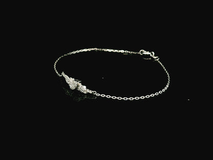 18K white gold diamond bracelet with round and baguette diamond cluster, 0.20 carat minimalist chain – Emirates Diamonds