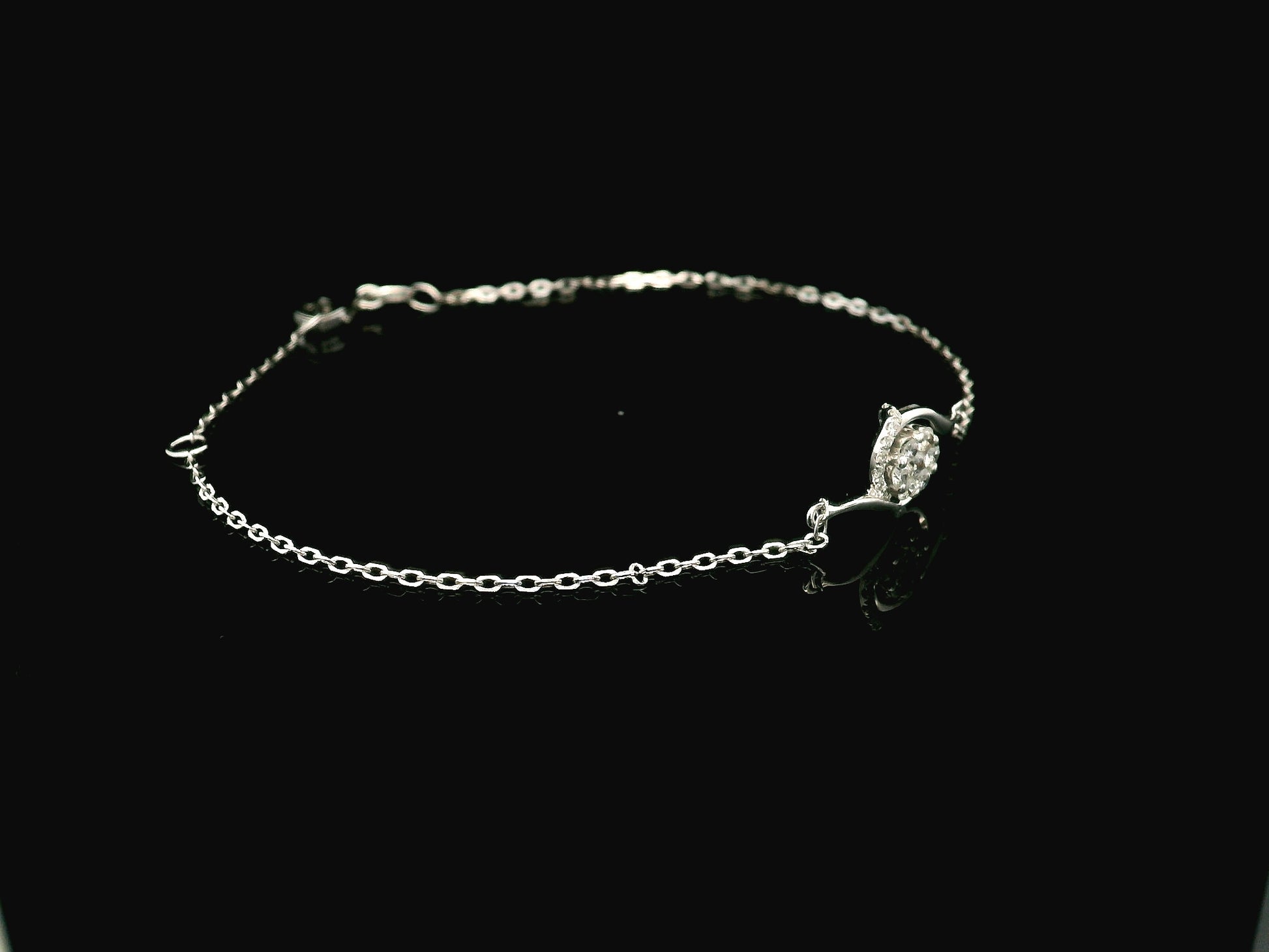 18K white gold diamond bracelet with swirl motif and cluster diamonds, 0.17 carat minimalist chain bracelet – Emirates Diamonds
