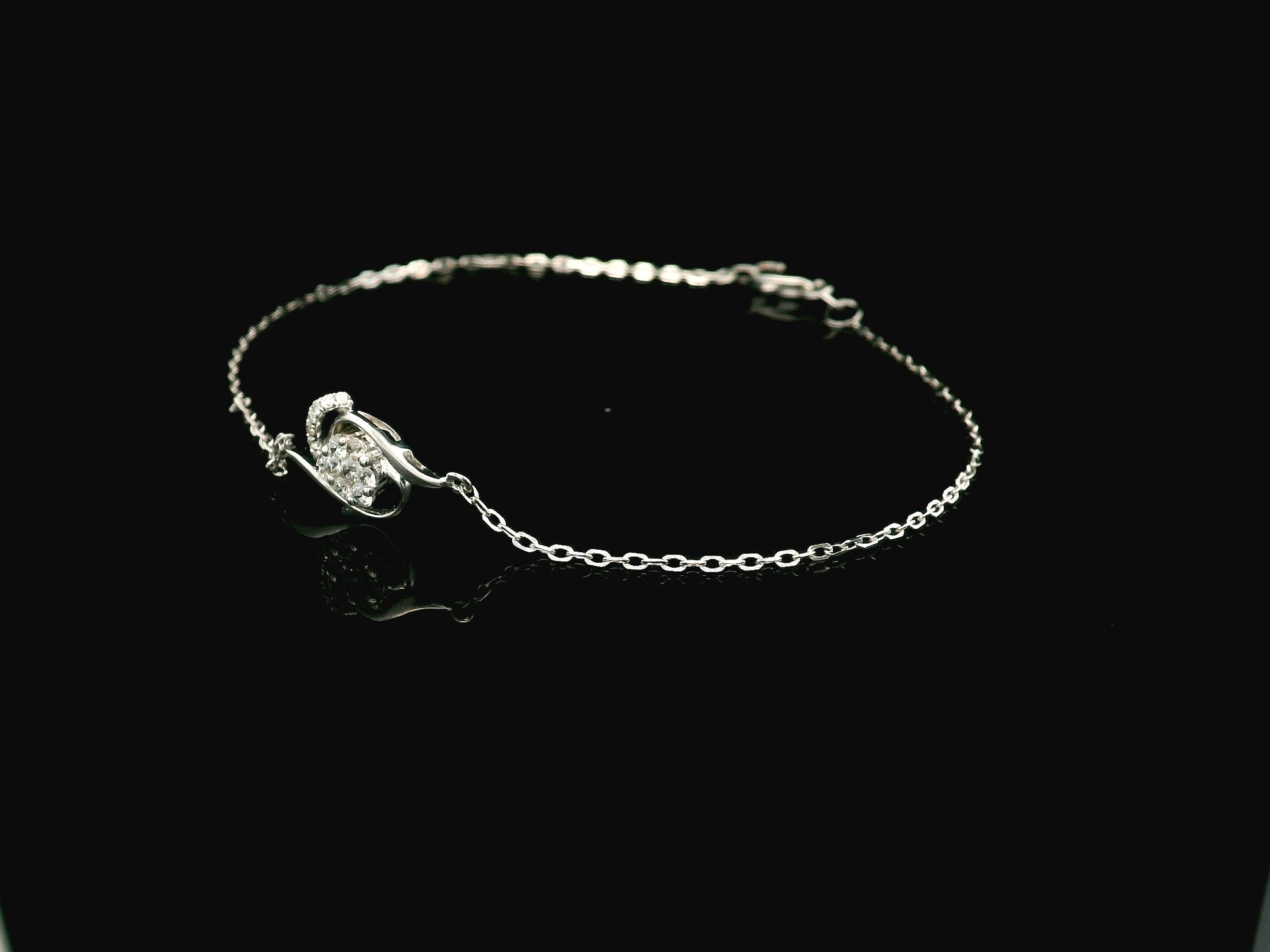 18K white gold diamond bracelet with swirl motif and cluster diamonds, 0.17 carat minimalist chain bracelet – Emirates Diamonds