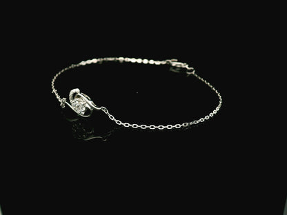 18K white gold diamond bracelet with swirl motif and cluster diamonds, 0.17 carat minimalist chain bracelet – Emirates Diamonds