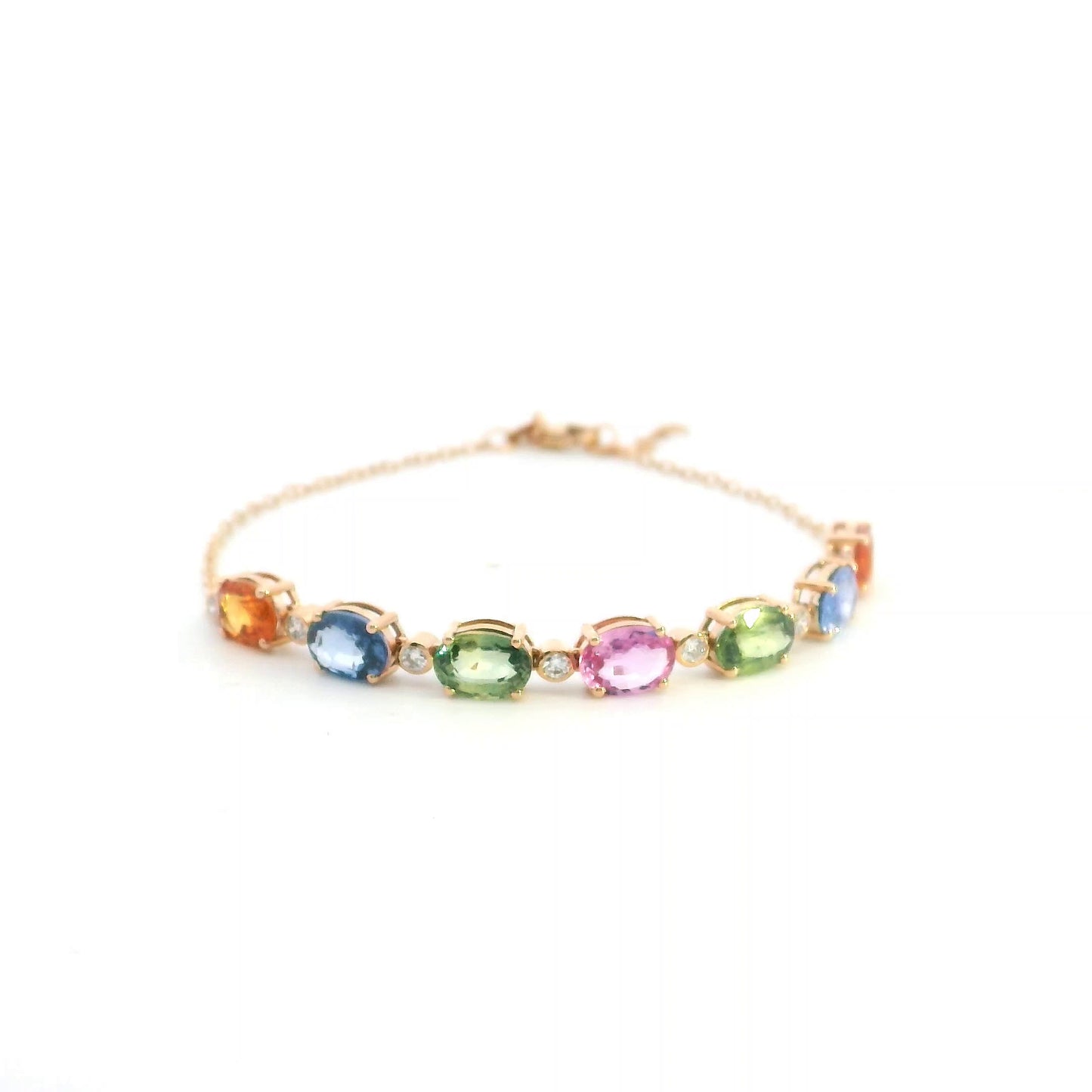 Multi color sapphire and diamond bracelet in 18K rose gold with oval pastel gemstones