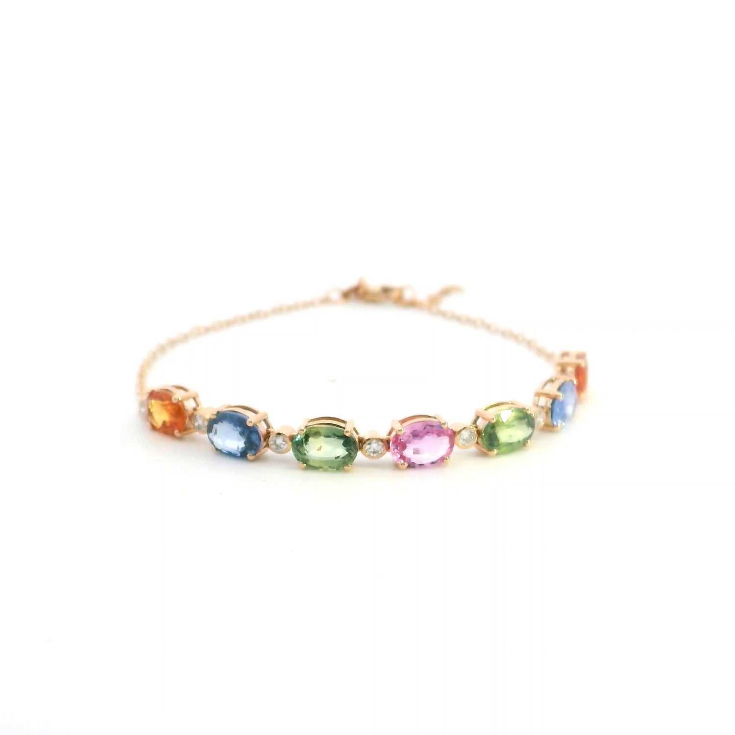 Multi color sapphire and diamond bracelet in 18K rose gold with oval pastel gemstones