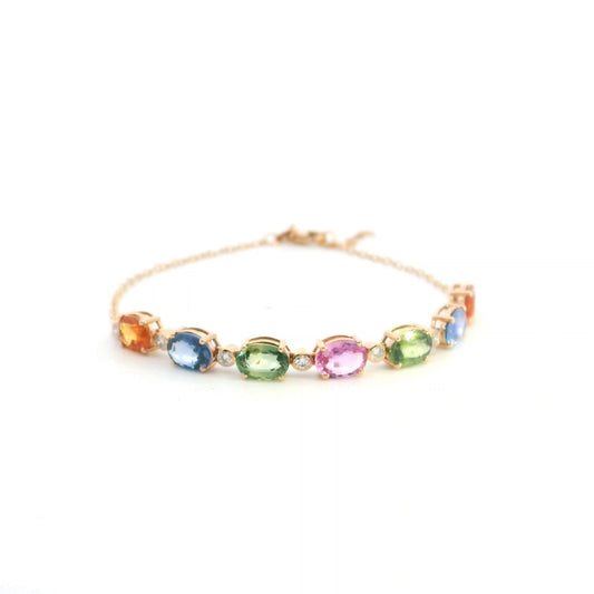 Multi color sapphire and diamond bracelet in 18K rose gold with oval pastel gemstones