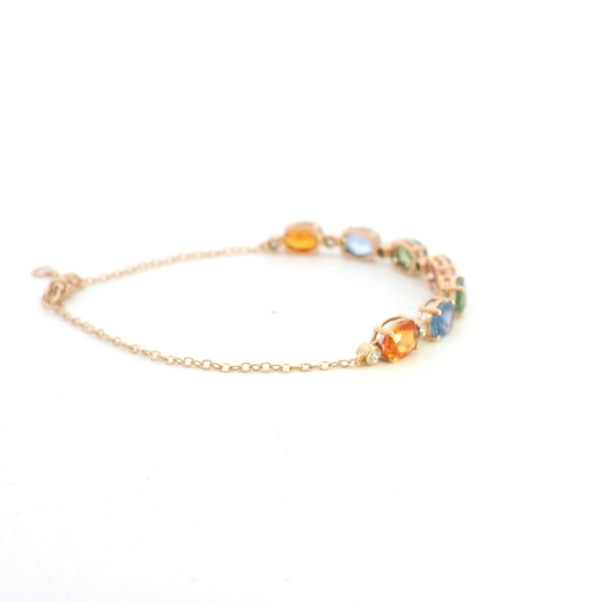 Multi color sapphire and diamond bracelet in 18K rose gold with oval pastel gemstones