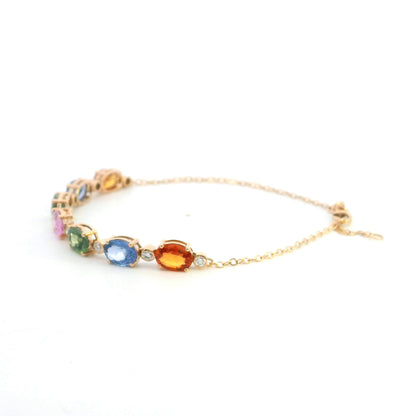 Multi color sapphire and diamond bracelet in 18K rose gold with oval pastel gemstones