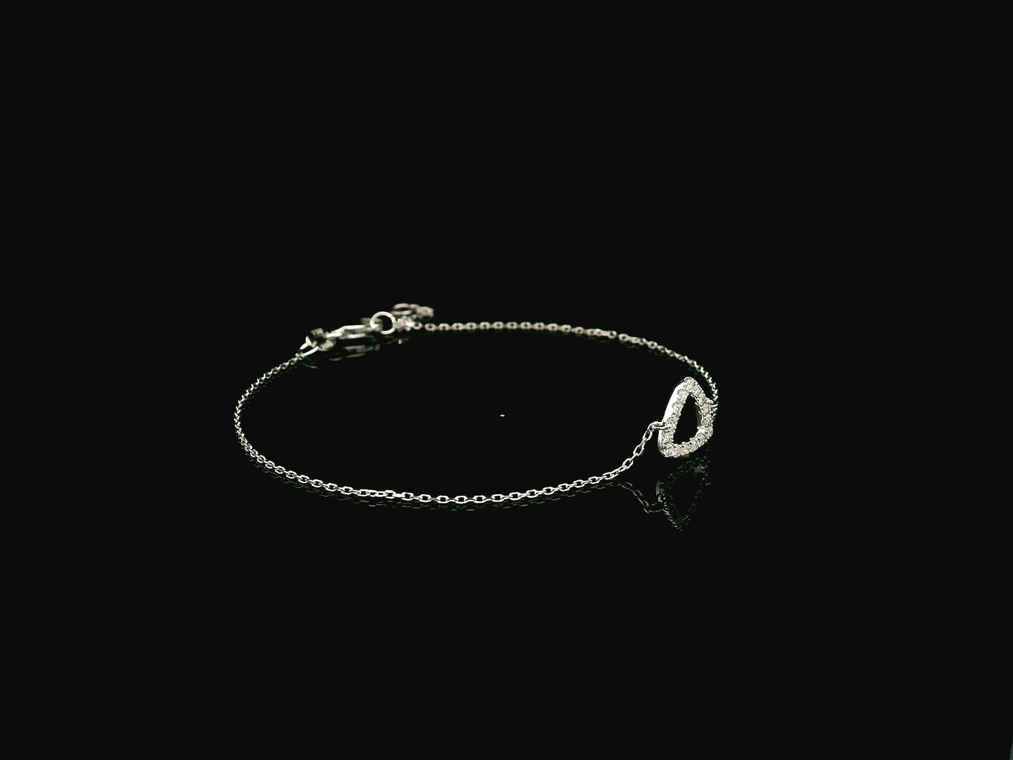Diamond triangle bracelet in 18K white gold by Emirates Diamonds
