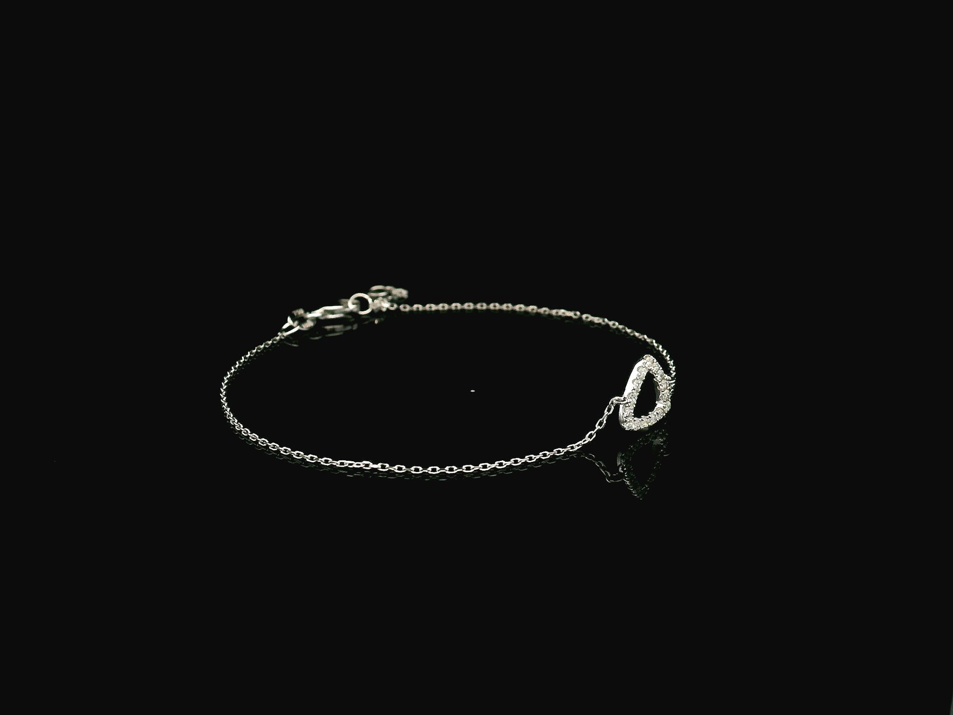 Diamond triangle bracelet in 18K white gold by Emirates Diamonds