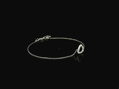 Diamond triangle bracelet in 18K white gold by Emirates Diamonds