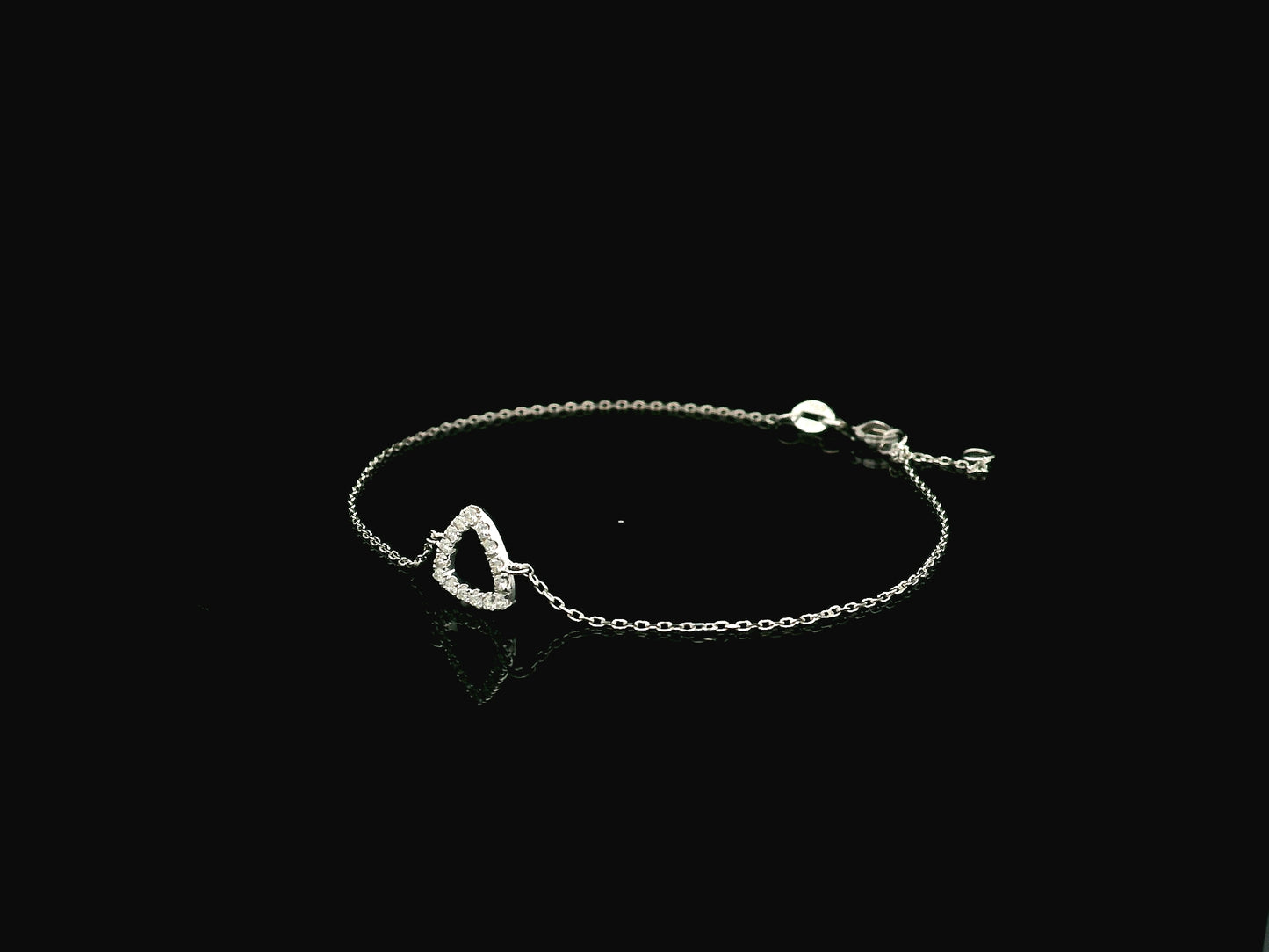 Diamond triangle bracelet in 18K white gold by Emirates Diamonds