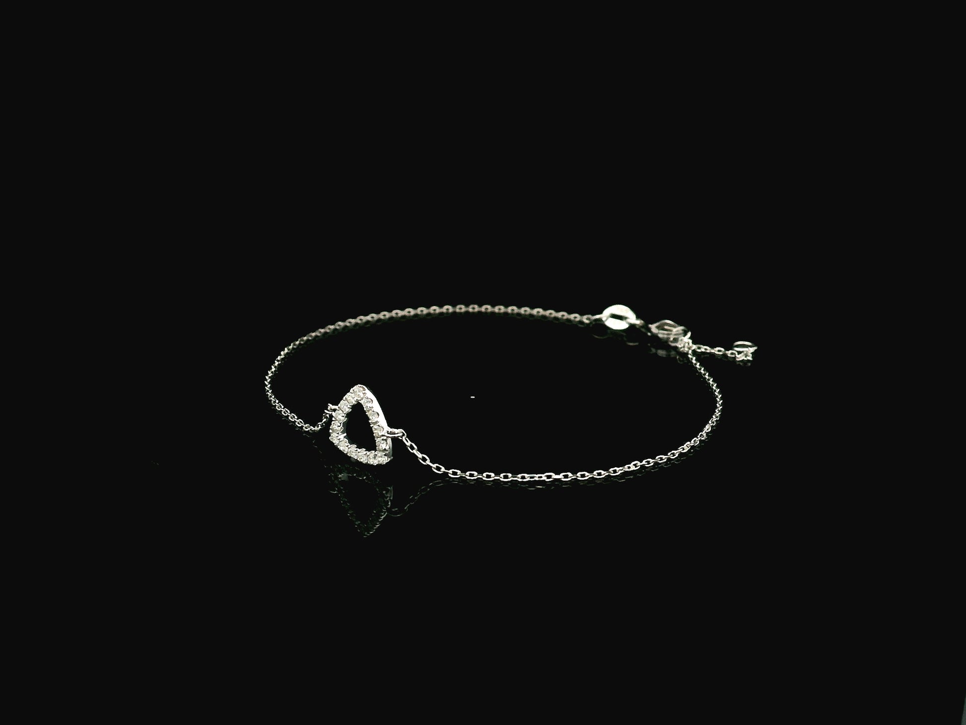 Diamond triangle bracelet in 18K white gold by Emirates Diamonds