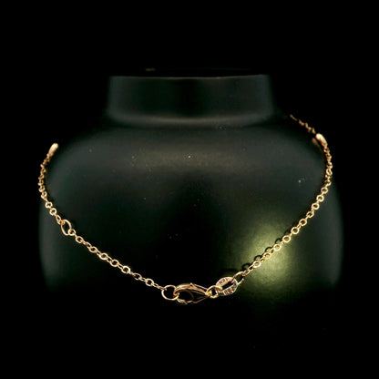 18K Rose Gold Diamond Station Bracelet featuring five bezel-set natural diamonds totalling 0.14 carat.