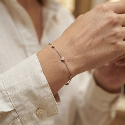 18K Rose Gold Diamond Station Bracelet featuring five bezel-set natural diamonds totalling 0.14 carat.