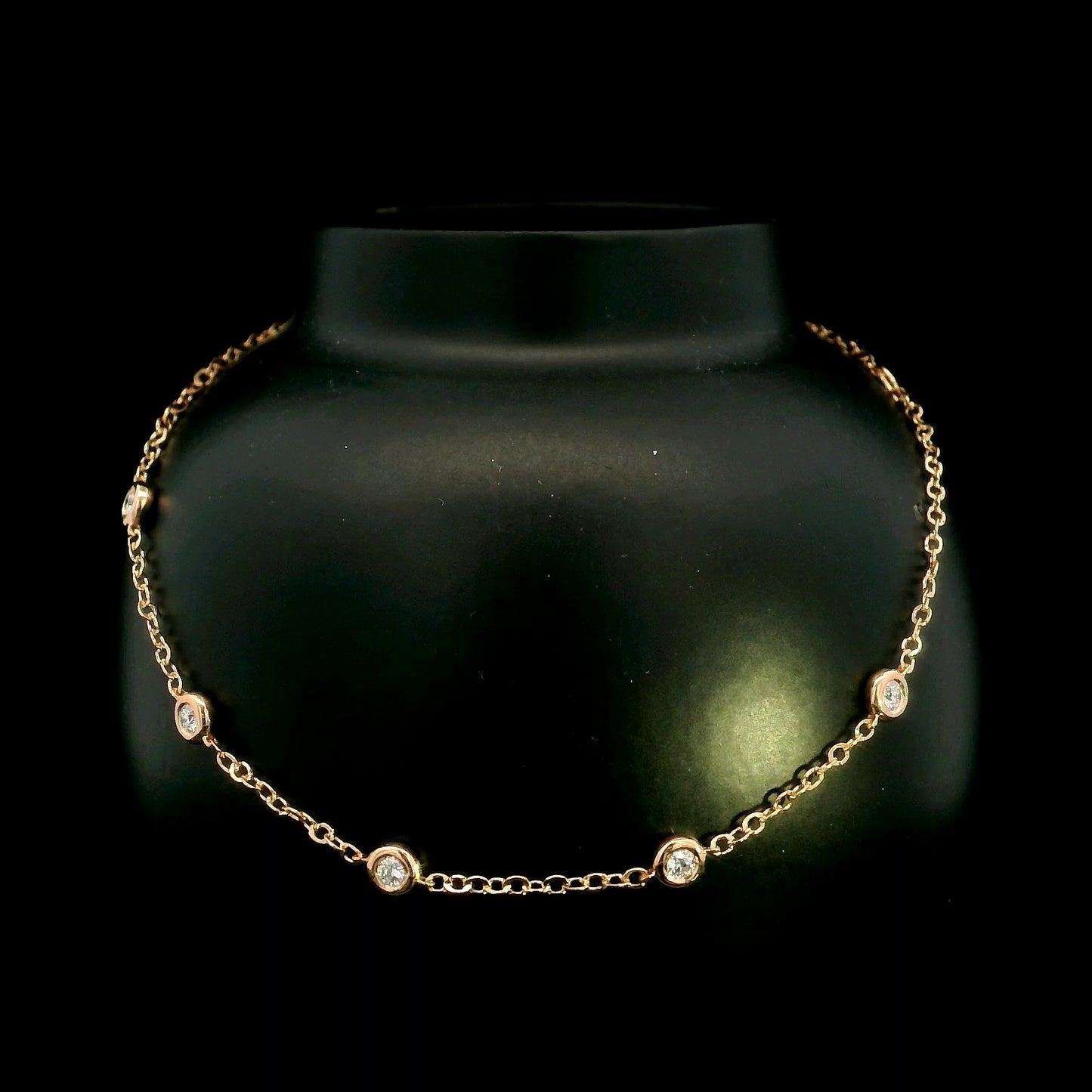 18K Rose Gold Diamond Station Bracelet featuring five bezel-set natural diamonds totalling 0.14 carat.