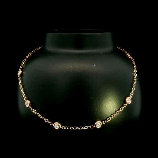 18K Rose Gold Diamond Station Bracelet featuring five bezel-set natural diamonds totalling 0.14 carat.