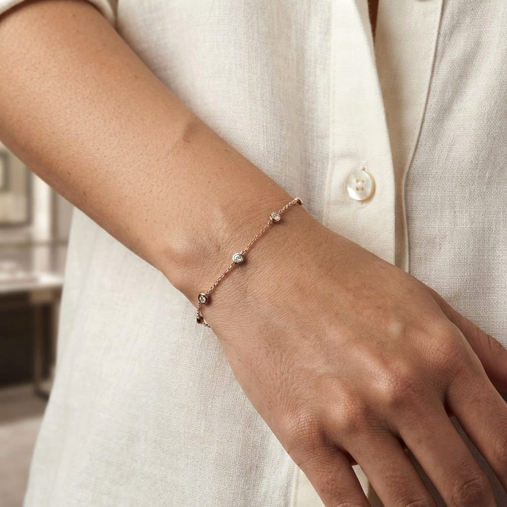 18K Rose Gold Diamond Station Bracelet featuring five bezel-set natural diamonds totalling 0.14 carat.