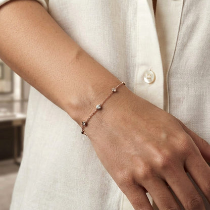 18K Rose Gold Diamond Station Bracelet featuring five bezel-set natural diamonds totalling 0.14 carat.