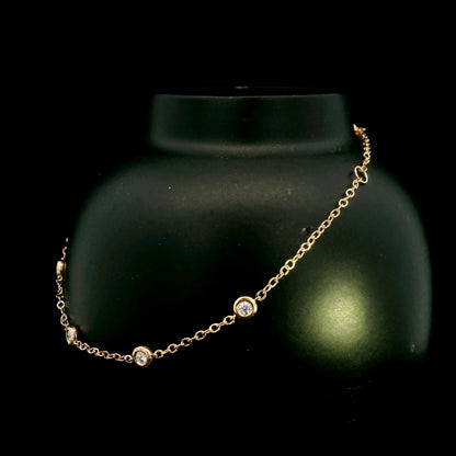 18K Rose Gold Diamond Station Bracelet featuring five bezel-set natural diamonds totalling 0.14 carat.