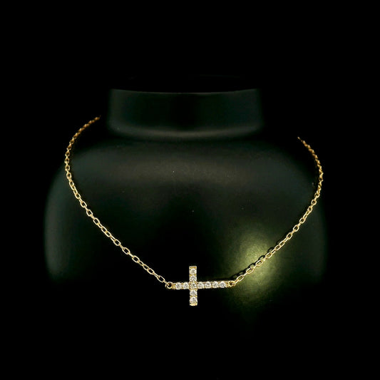 18K yellow gold sideways diamond cross bracelet with round natural diamonds and adjustable fine gold chain