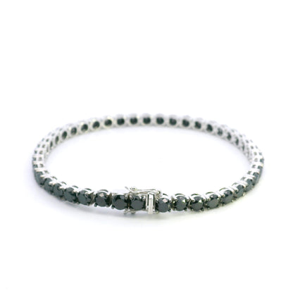 Black diamond tennis bracelet in 18K white gold with a continuous single row of round black diamonds