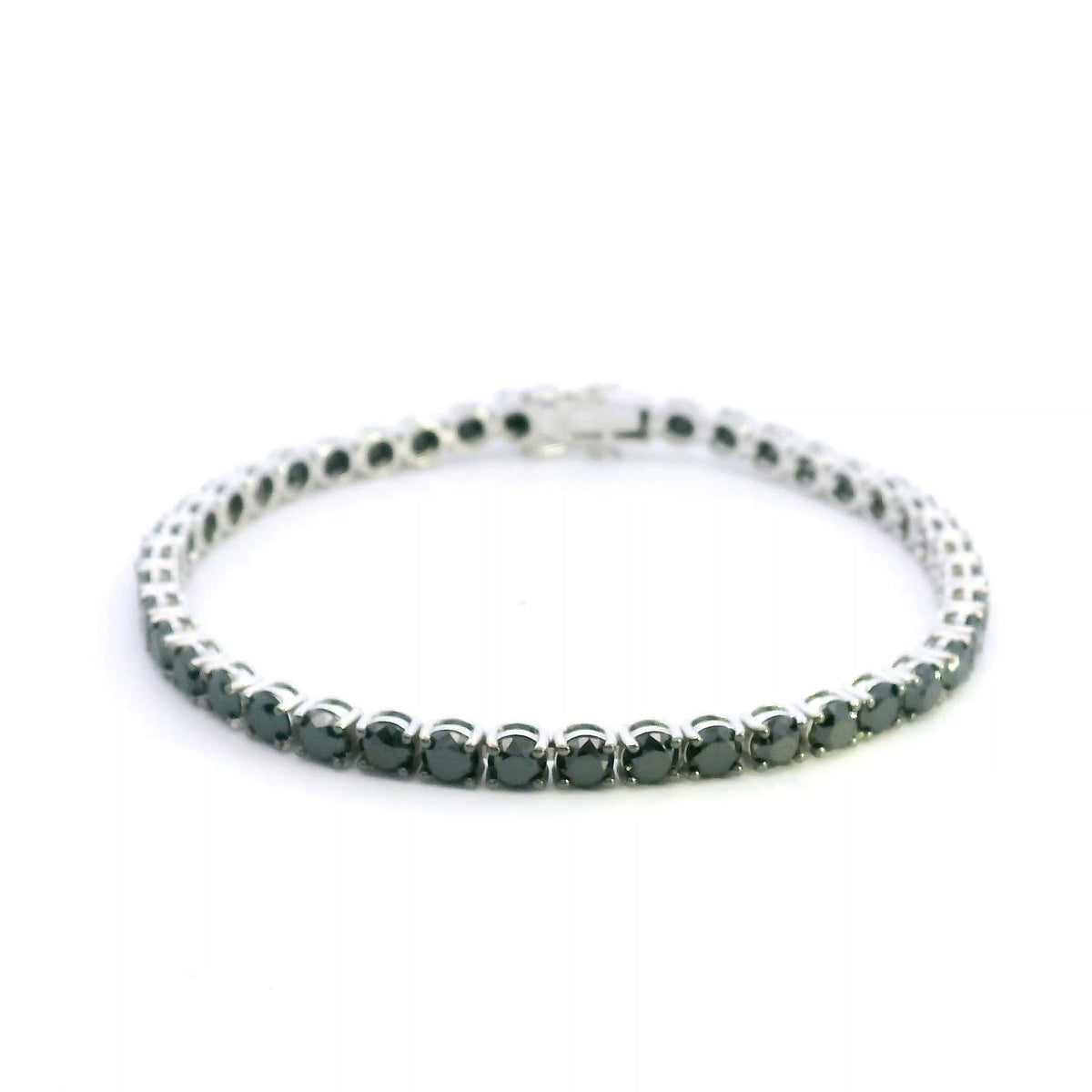 Black diamond tennis bracelet in 18K white gold with a continuous single row of round black diamonds
