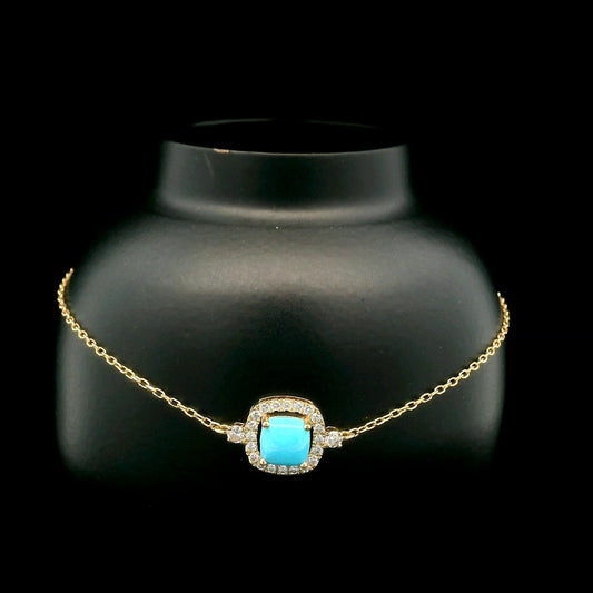 18K yellow gold turquoise and diamond bracelet with cushion-shaped turquoise cabochon, diamond halo and diamond side accents