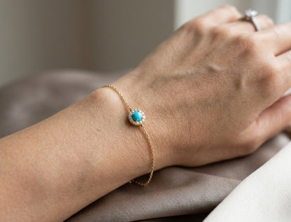 Turquoise and diamond halo bracelet in 18K yellow gold