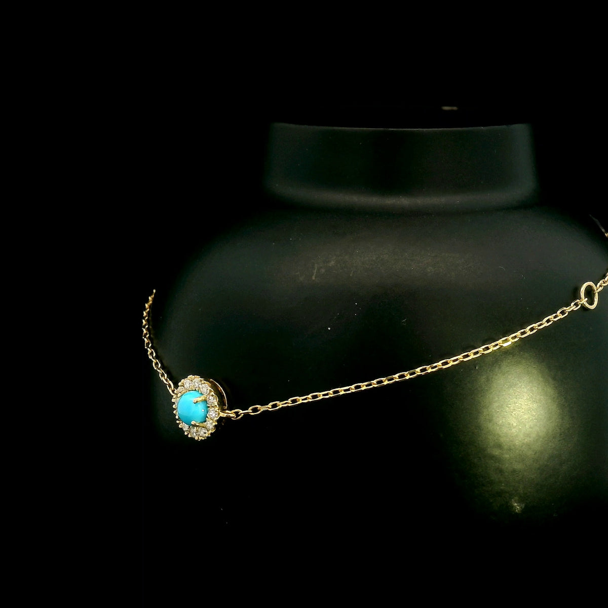 Turquoise and diamond halo bracelet in 18K yellow gold