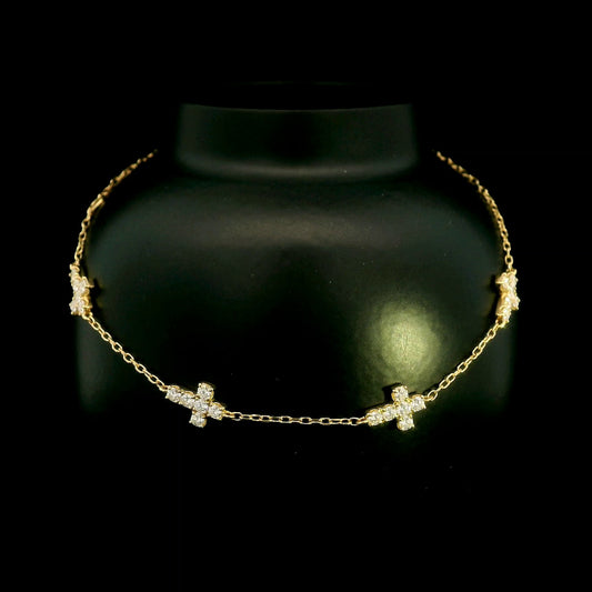 Diamond cross station bracelet in 18K yellow gold with multiple diamond cross motifs