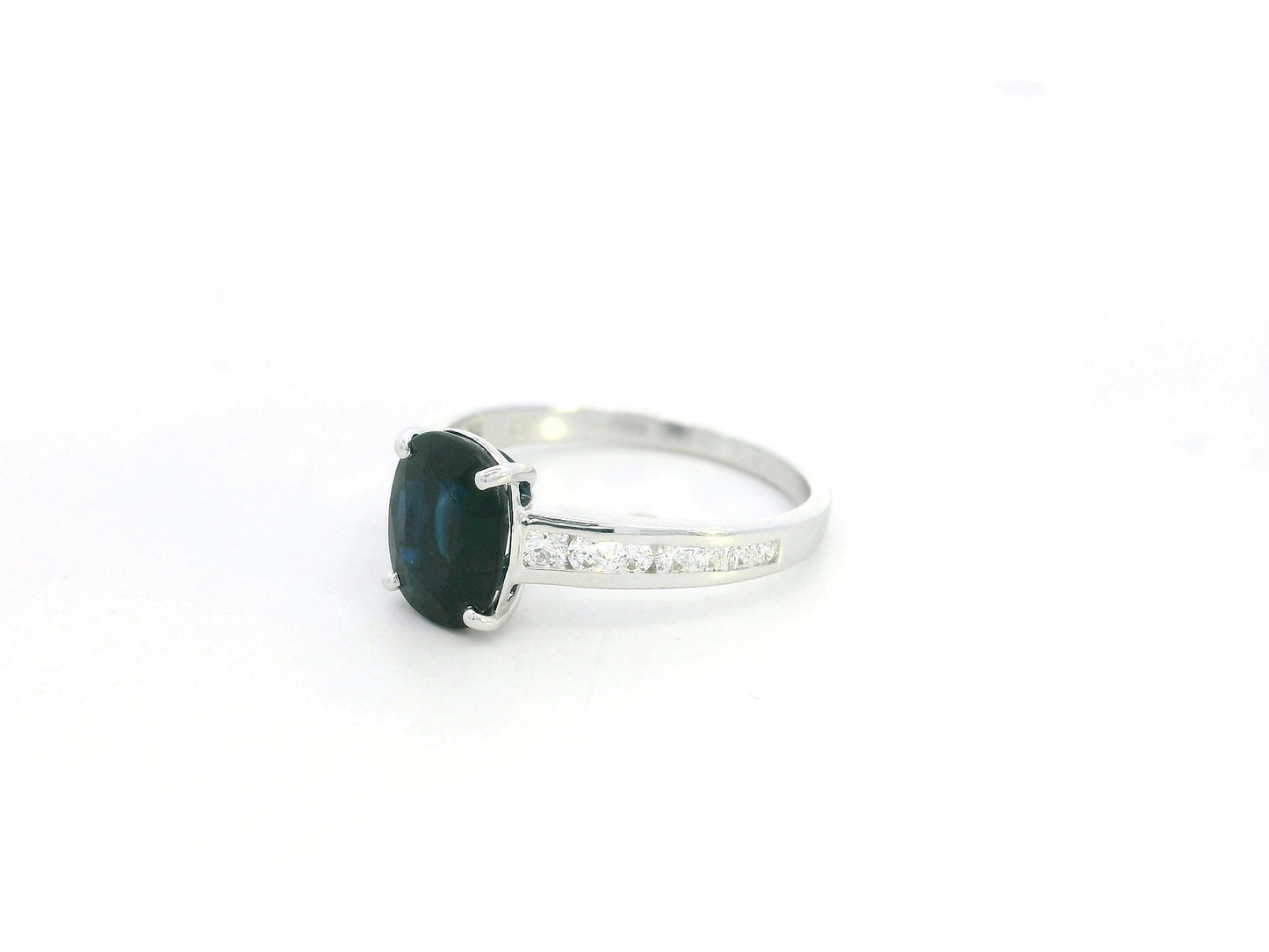 Oval blue sapphire ring 2.33 carat with diamond accents in 18K white gold by Emirates Diamonds