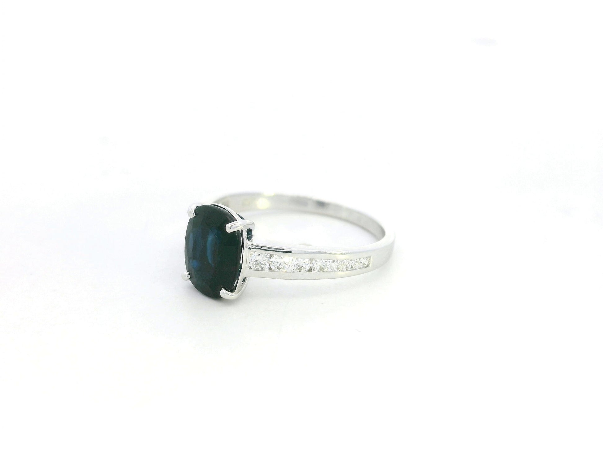 Oval blue sapphire ring 2.33 carat with diamond accents in 18K white gold by Emirates Diamonds