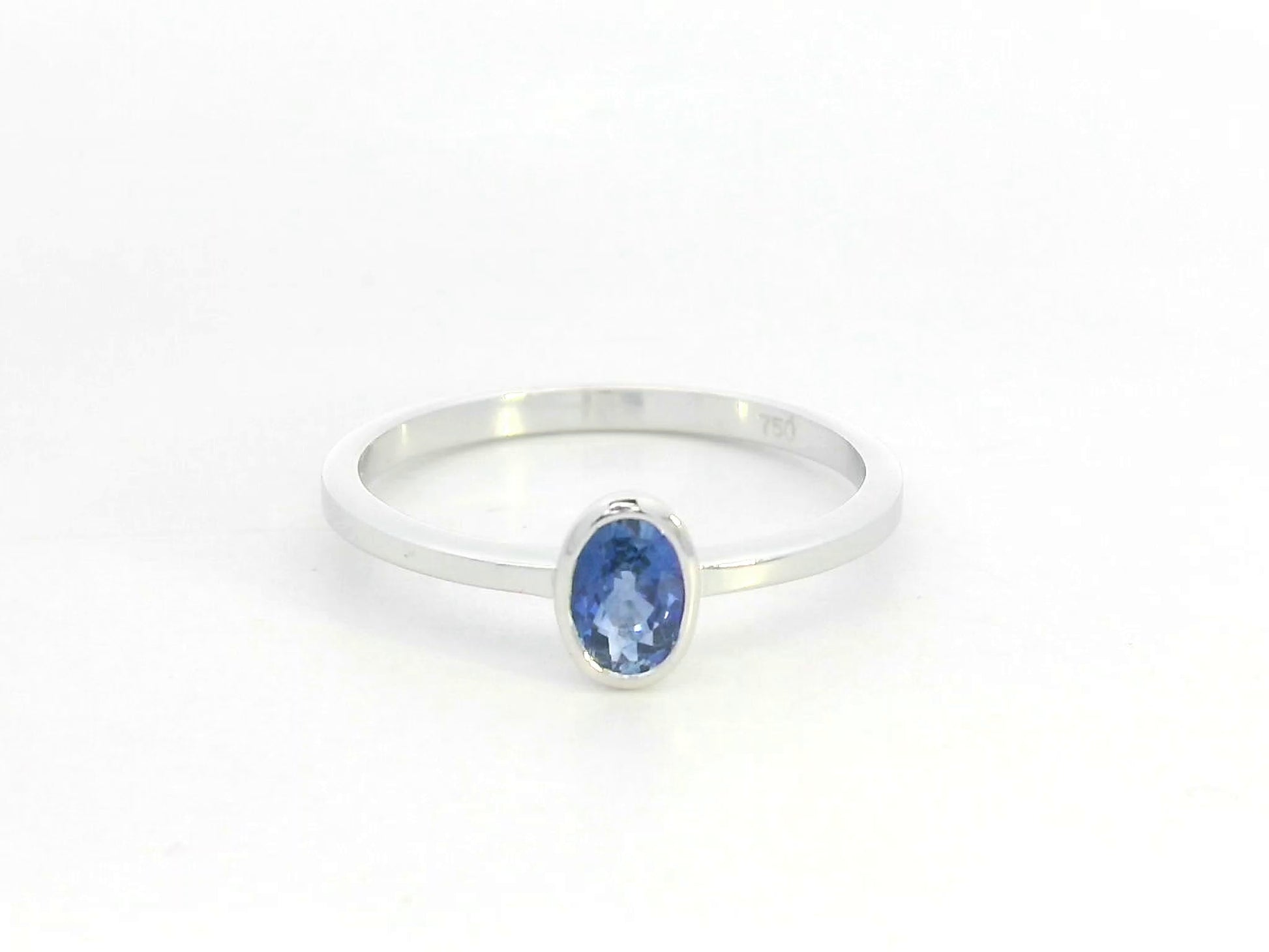 Blue sapphire solitaire ring 0.55 carat oval sapphire in 18K white gold by Emirates Diamonds