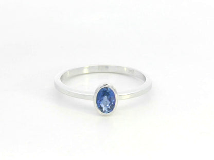 Blue sapphire solitaire ring 0.55 carat oval sapphire in 18K white gold by Emirates Diamonds