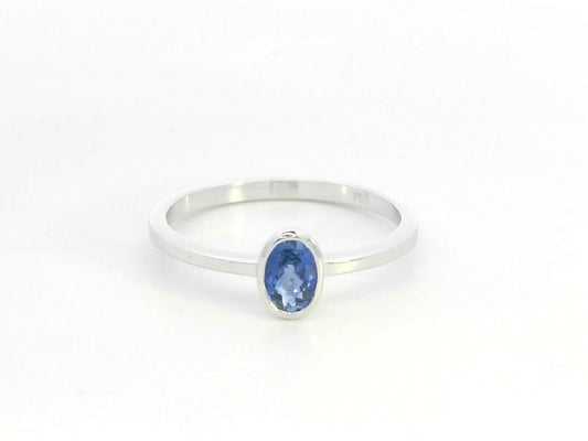 Blue sapphire solitaire ring 0.55 carat oval sapphire in 18K white gold by Emirates Diamonds