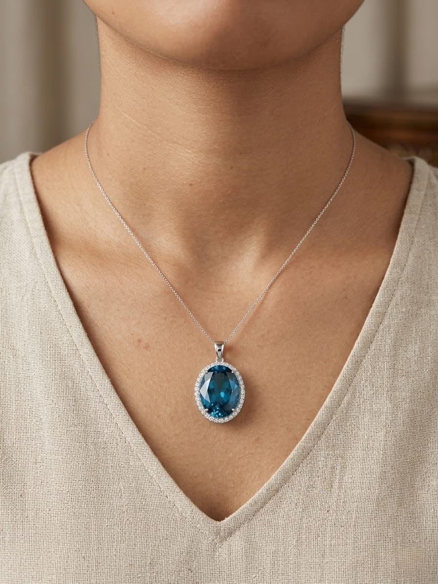 Swiss Blue Topaz & Diamond Halo Pendant in 18K White Gold