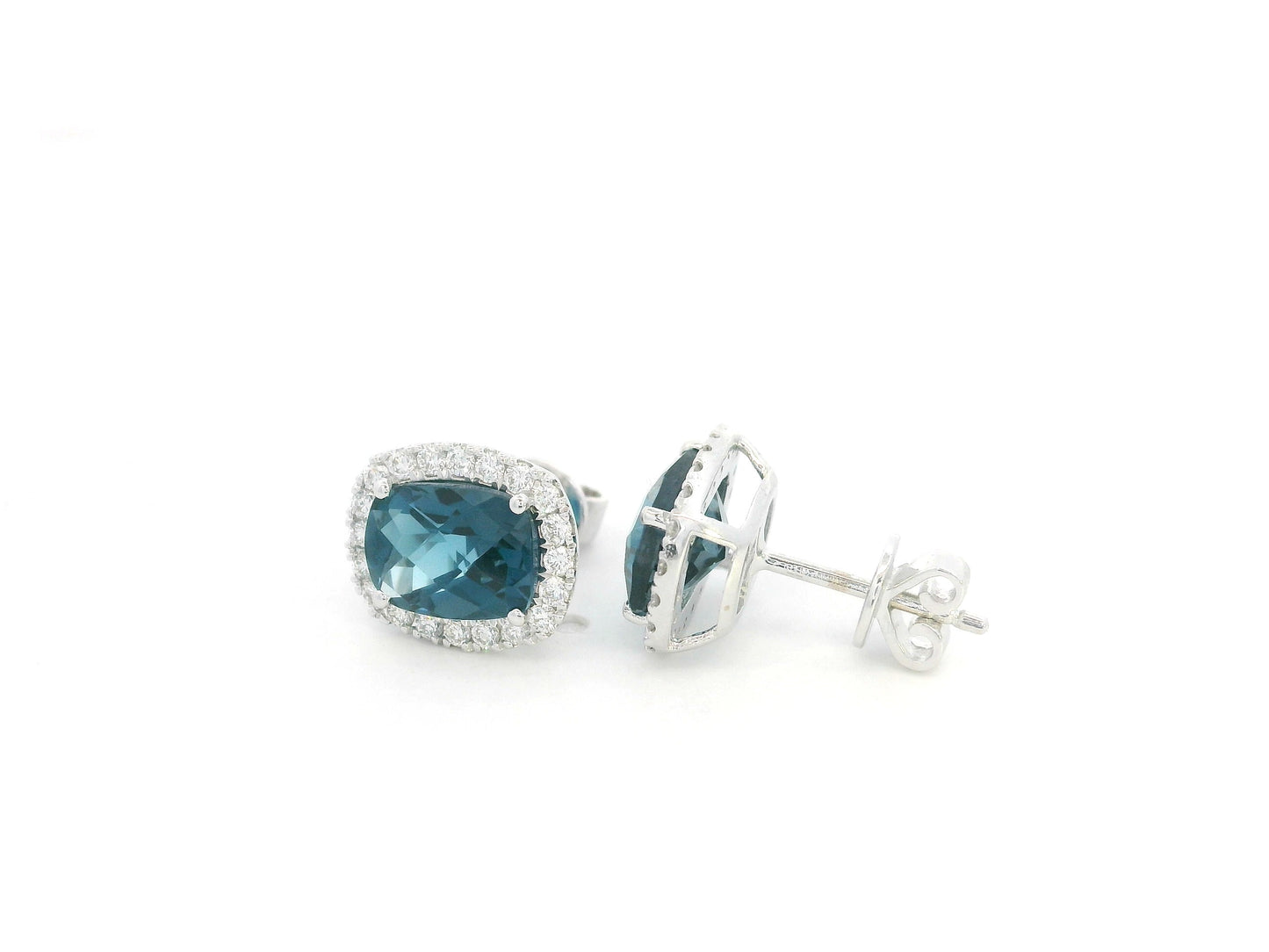 18K White Gold London Blue Topaz Diamond Halo Stud Earrings featuring 3.54 carats of natural London Blue Topaz and 0.40 carats of natural diamonds.