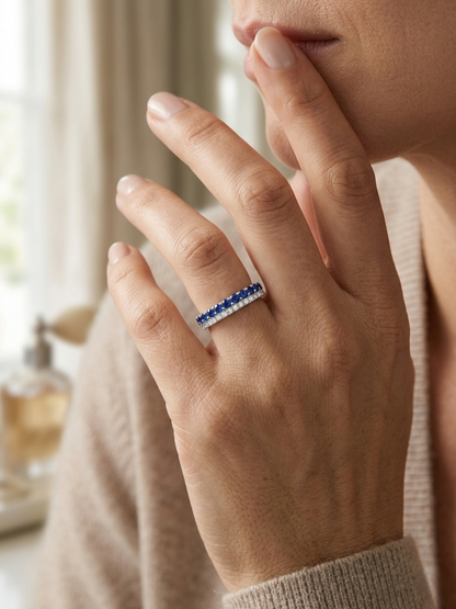 Blue sapphire and diamond band ring in 18K white gold featuring 0.62 carats of sapphires and 0.25 carats of diamonds by Emirates Diamonds.
